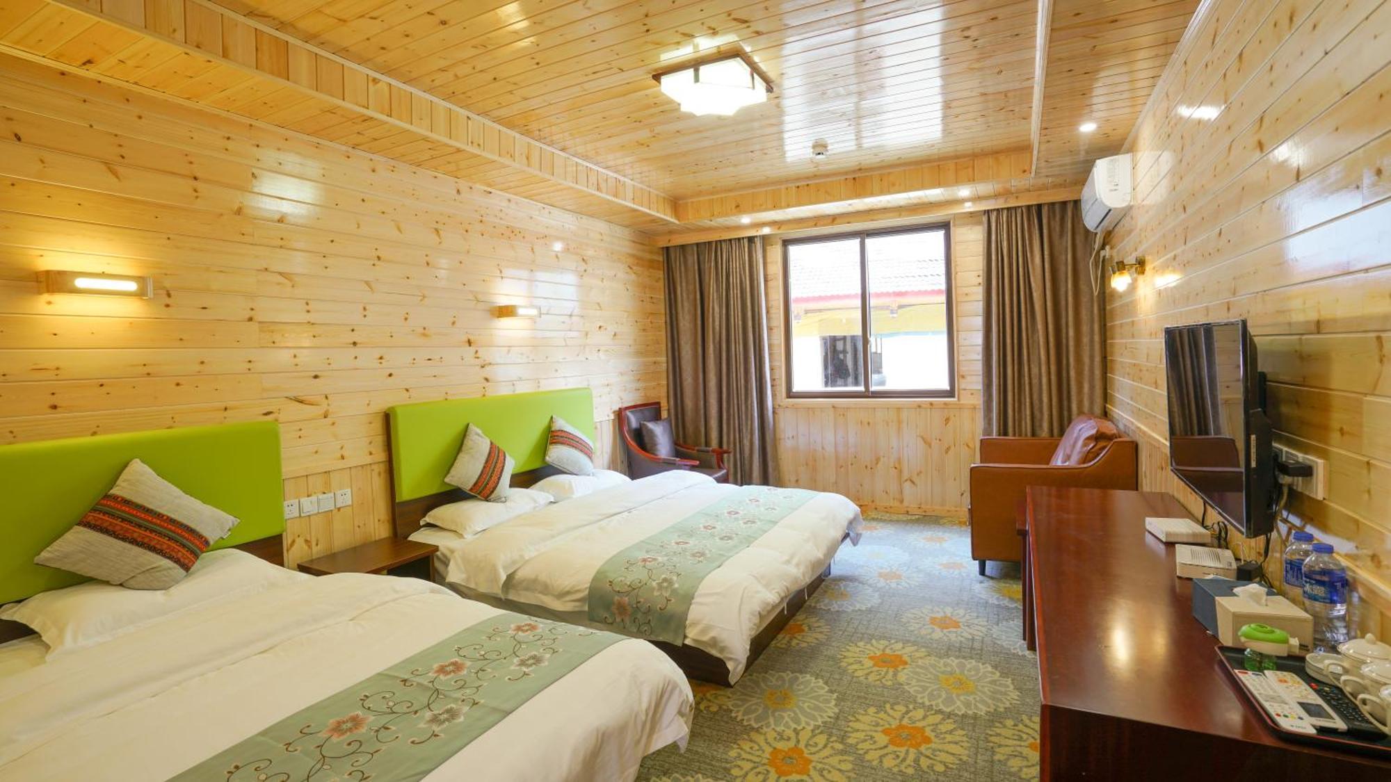 Jiuzhaigou Leisure Inn Oda fotoğraf